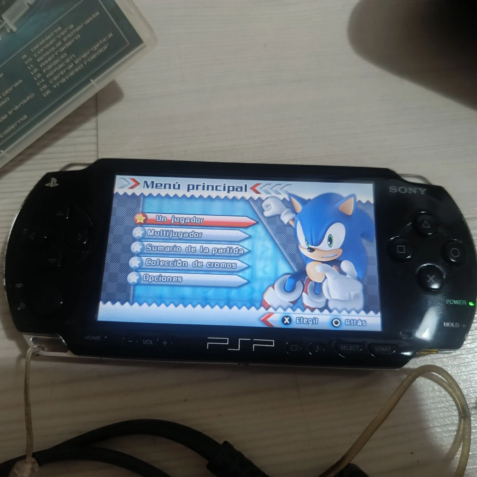 Pack Sony PSP + étui rigide + chargeur d'origine + carte 2 Go + 5 jeux – photo 6